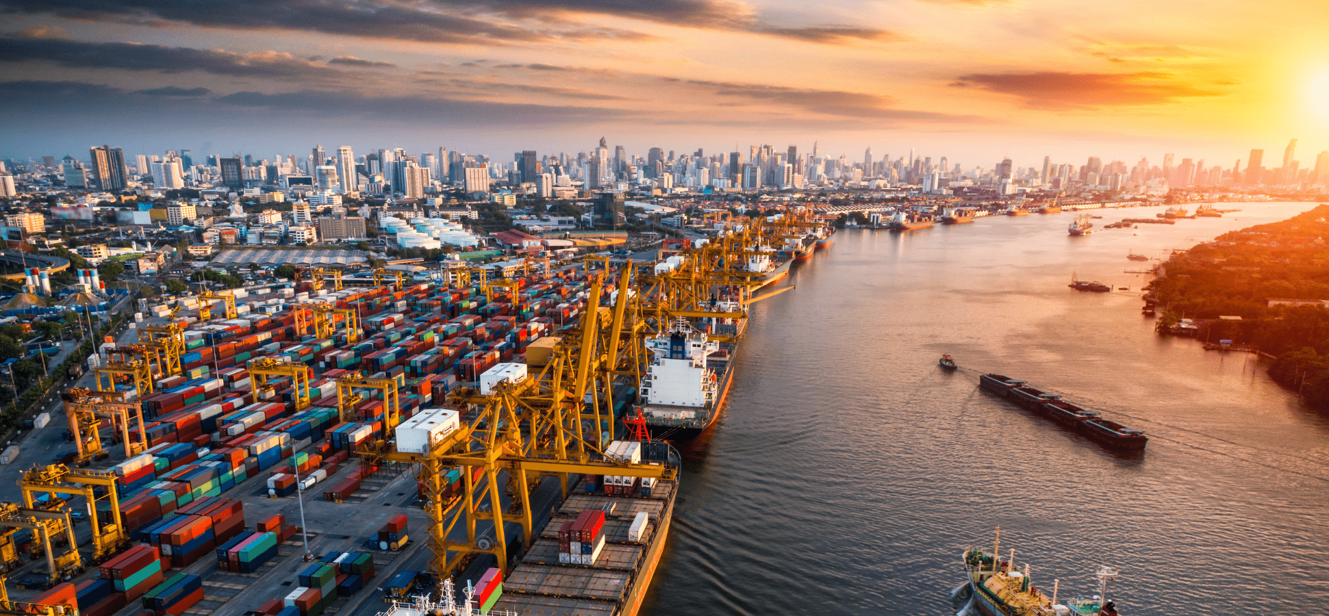 Logistics and transportation of container cargo ship and cargo plane with working crane bridge in shipyard at sunrise.